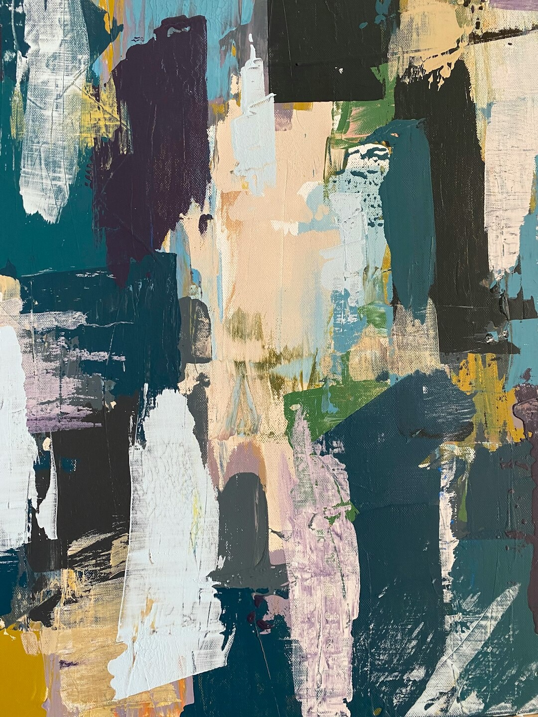 Colorful abstract painting with bold geometric shapes and brushstrokes